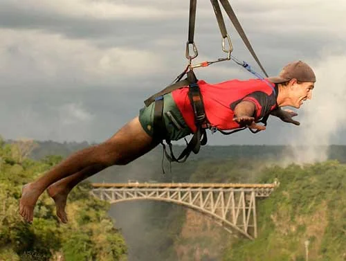 Visitor suspended face down on a flying fox ride above the gorge